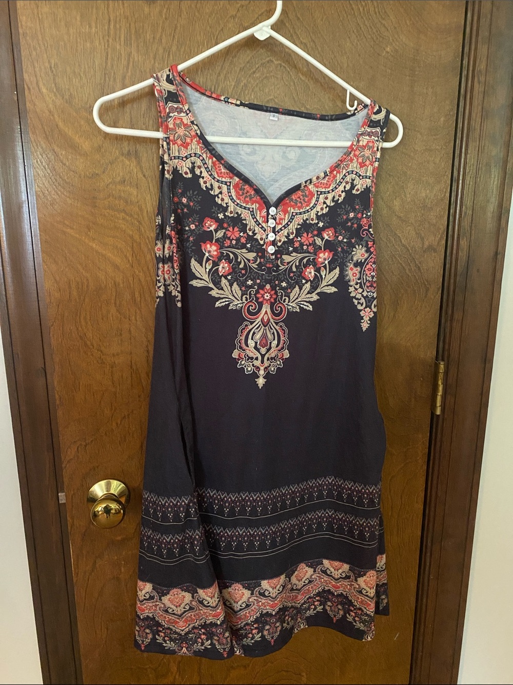 Sleeveless Boho Floral Border Print Dress in black and Coral